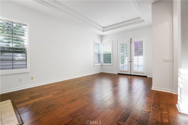12160 Glines Ct, Tustin, CA 92782 - empty room featuring dark wood-style floors and a raised ceiling