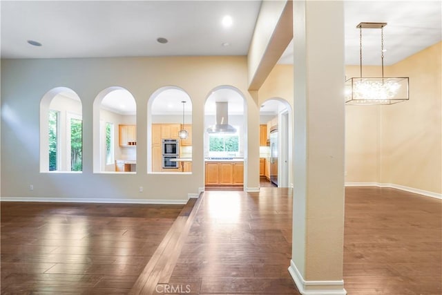 12160 Glines Ct, Tustin, CA 92782 - unfurnished living room featuring dark wood-style floors and healthy amount of natural light