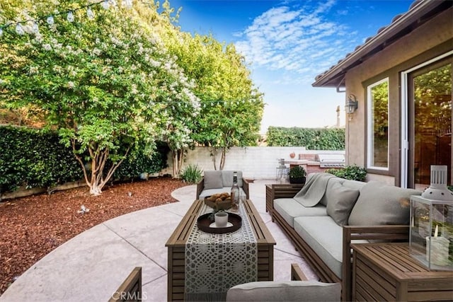 12160 Glines Ct, Tustin, CA 92782 - fenced backyard with outdoor lounge area and a patio area