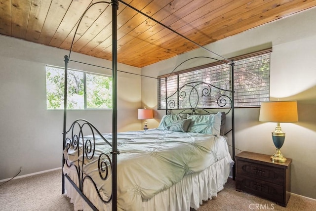 27495 Cedarwood Dr, Lake Arrowhead, CA 92352 - carpeted bedroom with wood ceiling and baseboards