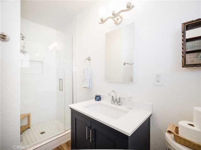 4239 Ish Dr, Simi Valley, CA 93063 - bathroom featuring a stall shower, toilet, and vanity
