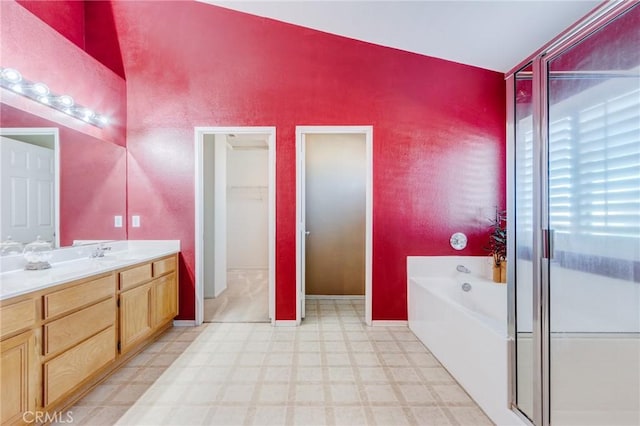 8961 Newcastle Ave, Hesperia, CA 92344 - bathroom featuring tile patterned floors, vanity, and a bath