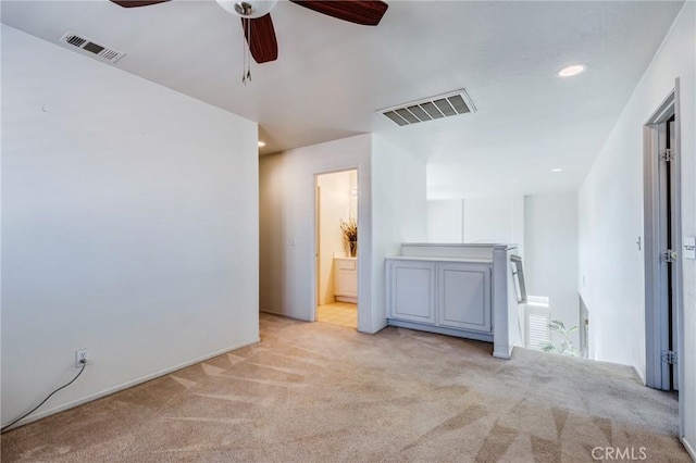 8961 Newcastle Ave, Hesperia, CA 92344 - unfurnished living room with light carpet, a ceiling fan, and recessed lighting