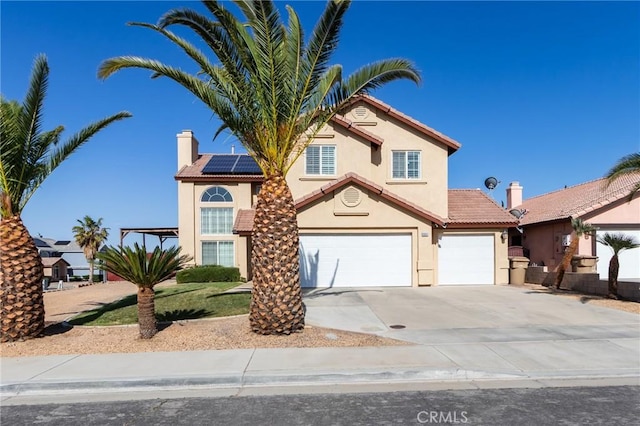 8961 Newcastle Ave, Hesperia, CA 92344 - traditional-style home featuring stucco siding, driveway, a tiled roof, and a chimney