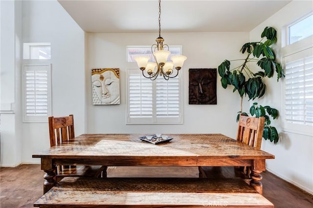 8961 Newcastle Ave, Hesperia, CA 92344 - dining space with a chandelier and baseboards