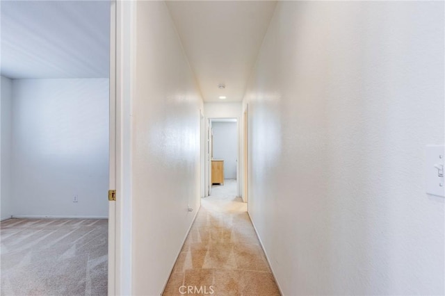 8961 Newcastle Ave, Hesperia, CA 92344 - hallway featuring light colored carpet and recessed lighting