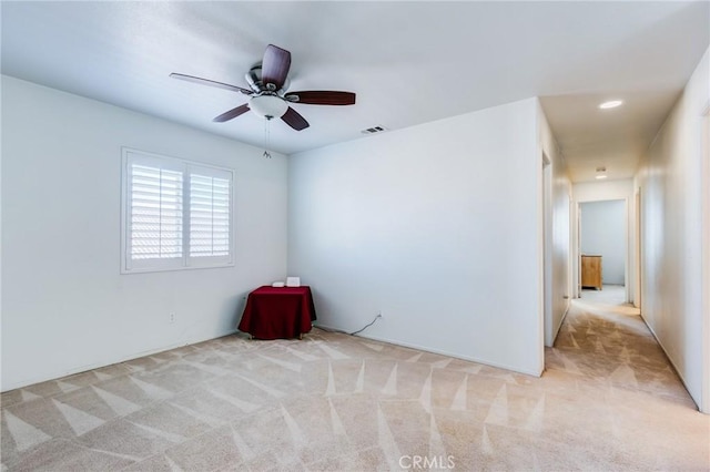 8961 Newcastle Ave, Hesperia, CA 92344 - empty room featuring light carpet and a ceiling fan