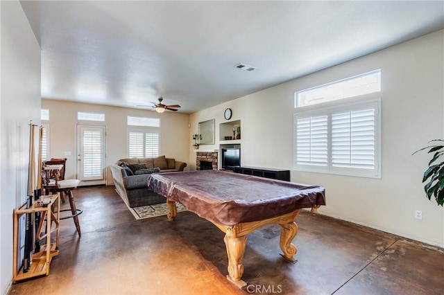 8961 Newcastle Ave, Hesperia, CA 92344 - rec room with finished concrete floors, a fireplace, ceiling fan, and billiards table