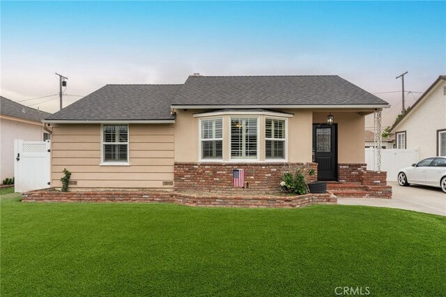 6003 Eastbrook Ave, Lakewood, CA 90713 - view of front of property featuring brick siding and a shingled roof