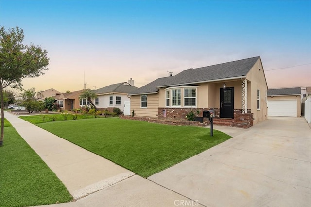 6003 Eastbrook Ave, Lakewood, CA 90713 - view of front of house with a lawn and brick siding