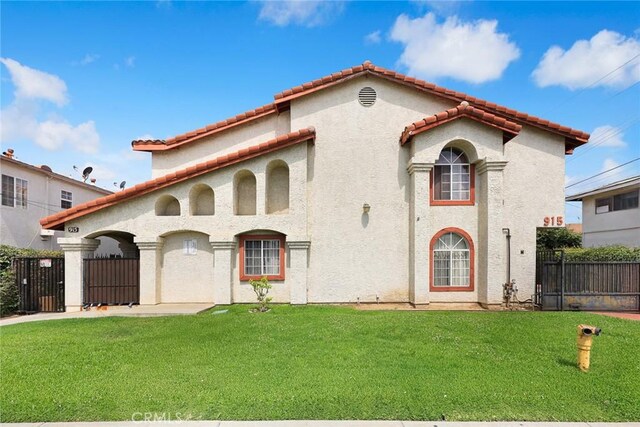 915 Carob Way Unit 2, Montebello, CA 90640 - mediterranean / spanish-style house with stucco siding and a tile roof