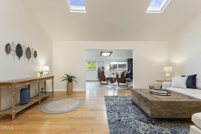 2791 Elizondo Ave, Simi Valley, CA 93065 - living area with a skylight, wood finished floors, and vaulted ceiling