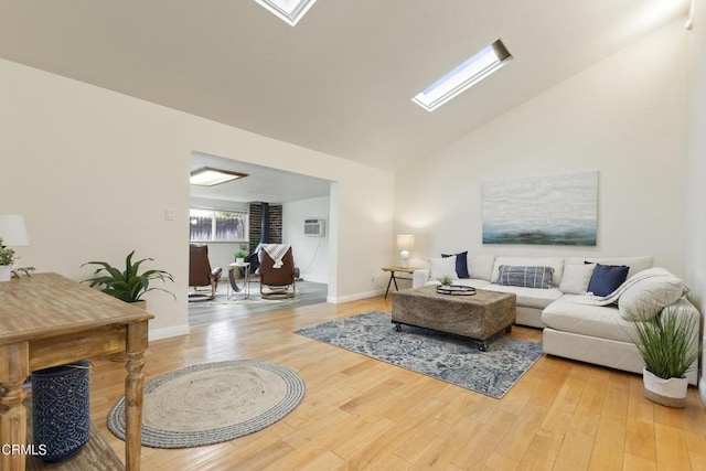 2791 Elizondo Ave, Simi Valley, CA 93065 - living room featuring a skylight, wood finished floors, high vaulted ceiling, and a wall mounted air conditioner