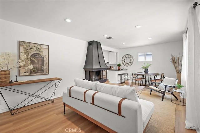 2482 New York Dr, Altadena, CA 91001 - living room with light wood finished floors and recessed lighting