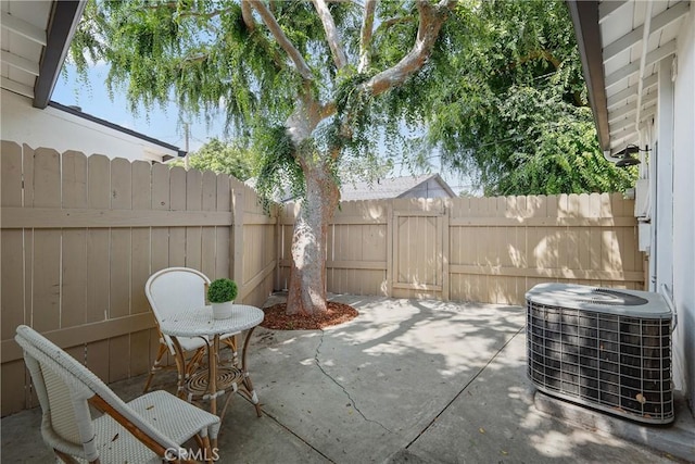 2482 New York Dr, Altadena, CA 91001 - view of patio featuring central air condition unit and a gate