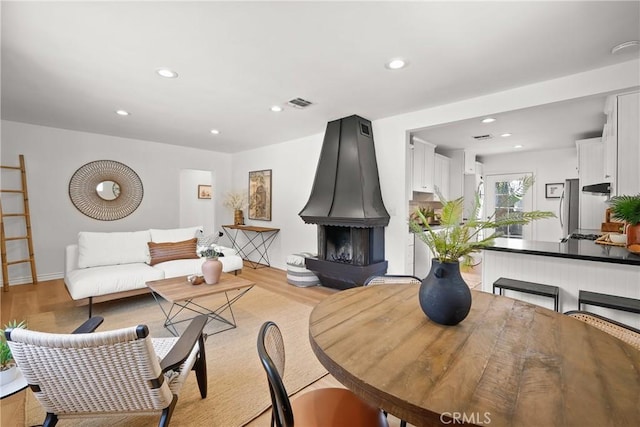 2482 New York Dr, Altadena, CA 91001 - living room with light wood-type flooring, recessed lighting, and baseboards