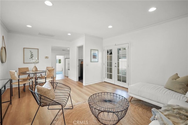 2482 New York Dr, Altadena, CA 91001 - living room featuring french doors, ornamental molding, light wood-style floors, recessed lighting, and baseboards