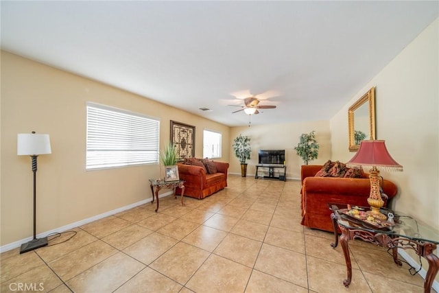 18427 Blue Sky St, Riverside, CA 92508 - living area featuring light tile patterned floors, ceiling fan, and baseboards