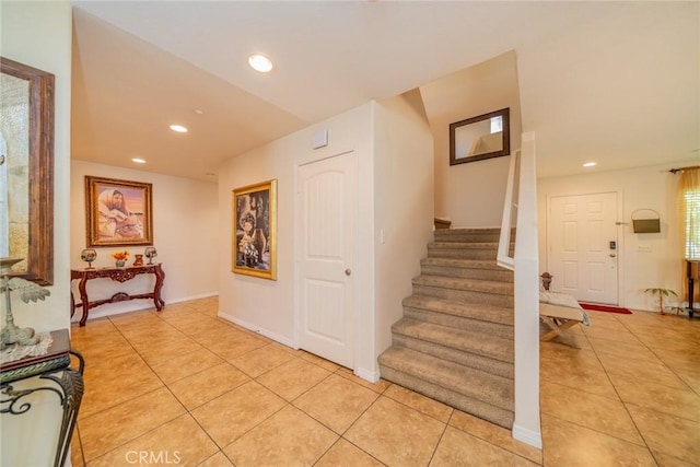 18427 Blue Sky St, Riverside, CA 92508 - staircase with tile patterned flooring and recessed lighting