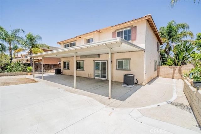 18427 Blue Sky St, Riverside, CA 92508 - rear view of property with central AC, stucco siding, and a patio