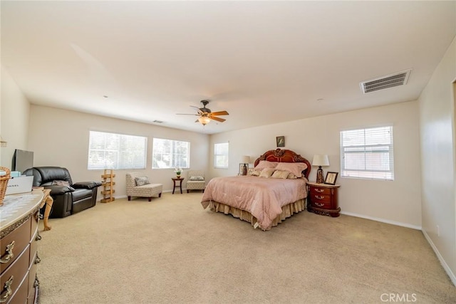 18427 Blue Sky St, Riverside, CA 92508 - bedroom with multiple windows, light colored carpet, ceiling fan, and baseboards
