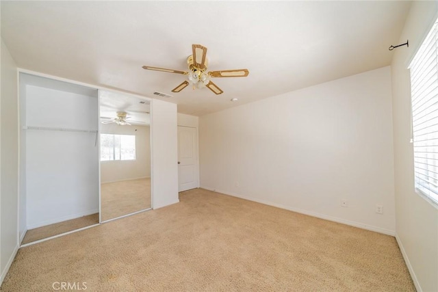 18427 Blue Sky St, Riverside, CA 92508 - unfurnished bedroom featuring light colored carpet, a ceiling fan, baseboards, and a closet