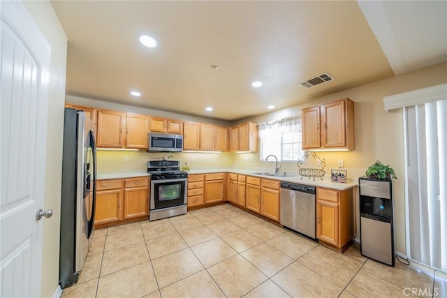 18427 Blue Sky St, Riverside, CA 92508 - kitchen featuring stainless steel appliances, a sink, light countertops, recessed lighting, and light brown cabinets