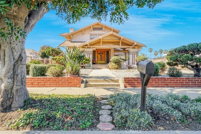 611 W 124th St, Los Angeles, CA 90044 - craftsman inspired home with a chimney and covered porch