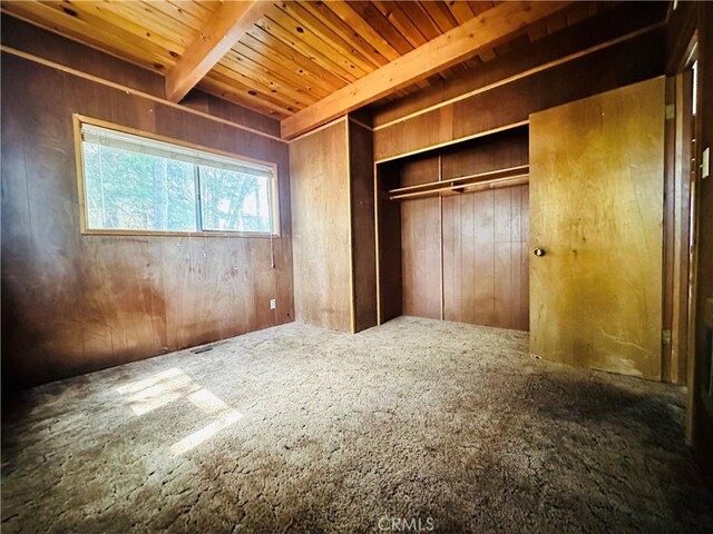 31506 Circle View Dr, Running Springs, CA 92382 - unfurnished bedroom featuring wooden ceiling, wooden walls, carpet flooring, and a closet