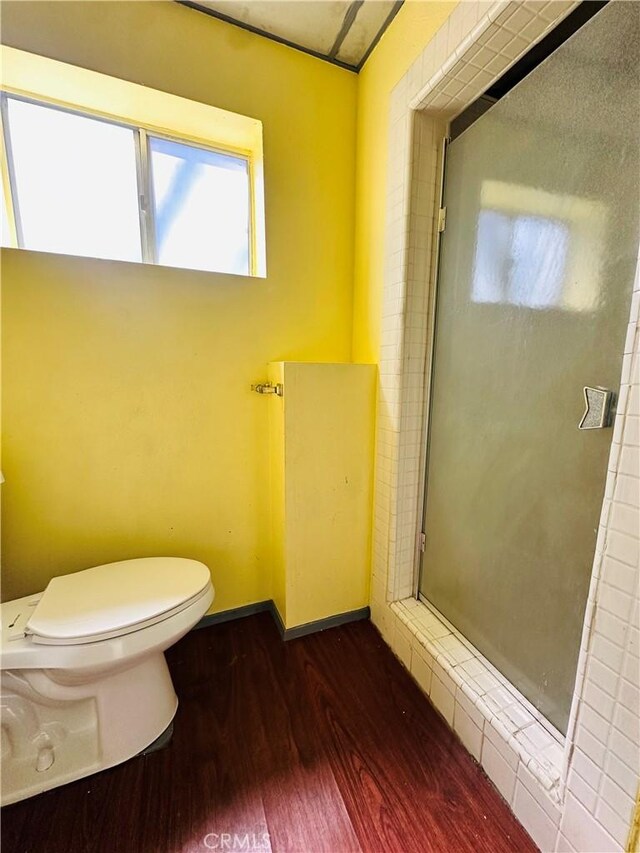 31506 Circle View Dr, Running Springs, CA 92382 - bathroom featuring wood finished floors, toilet, and a shower stall