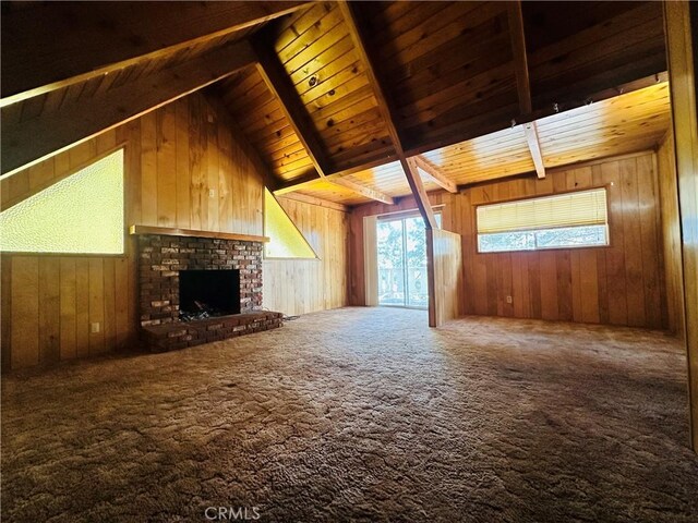 31506 Circle View Dr, Running Springs, CA 92382 - unfurnished living room featuring wooden walls, carpet floors, a brick fireplace, and wood ceiling
