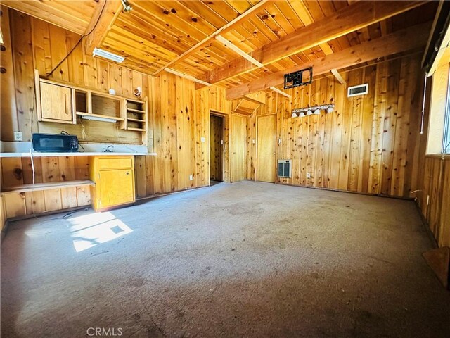31506 Circle View Dr, Running Springs, CA 92382 - kitchen with wooden ceiling with exposed beams, wooden walls, black microwave, carpet, and open shelves