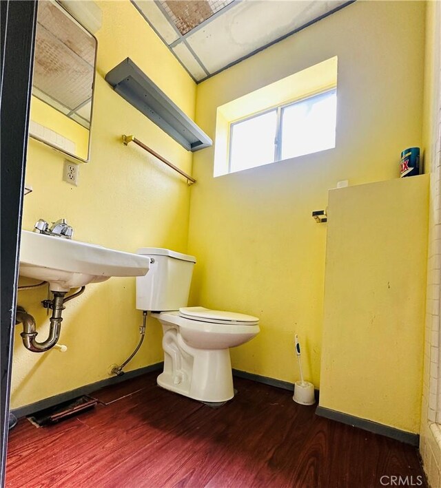 31506 Circle View Dr, Running Springs, CA 92382 - bathroom featuring toilet, wood finished floors, baseboards, and a sink