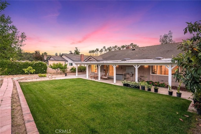 19545 Quicksilver Ln, Rowland Heights, CA 91748 - rear view of property with a lawn, a patio area, an attached carport, and stucco siding