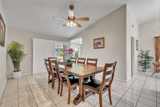 19545 Quicksilver Ln, Rowland Heights, CA 91748 - dining area with ceiling fan, light tile patterned flooring, high vaulted ceiling, and baseboards