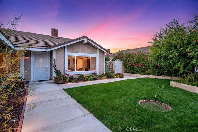19545 Quicksilver Ln, Rowland Heights, CA 91748 - single story home featuring a chimney, a lawn, stucco siding, and a tiled roof