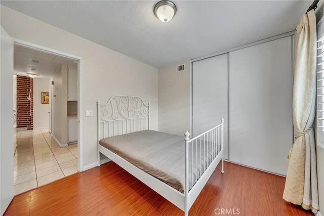 19545 Quicksilver Ln, Rowland Heights, CA 91748 - bedroom featuring light wood-style floors, a closet, and baseboards