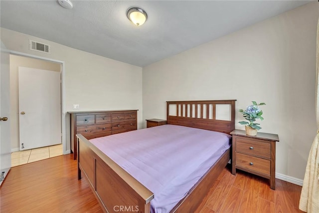 19545 Quicksilver Ln, Rowland Heights, CA 91748 - bedroom with light wood-style floors and baseboards