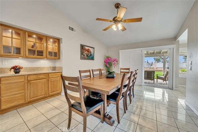 19545 Quicksilver Ln, Rowland Heights, CA 91748 - dining room with lofted ceiling, light tile patterned floors, ceiling fan, and baseboards
