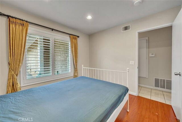 19545 Quicksilver Ln, Rowland Heights, CA 91748 - bedroom with baseboards, wood finished floors, and recessed lighting
