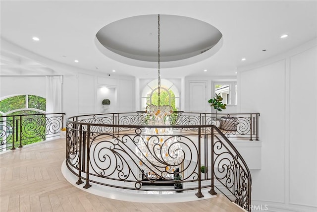 25548 Kingston Ct, Calabasas, CA 91302 - hall with a decorative wall, an upstairs landing, recessed lighting, a chandelier, and a raised ceiling