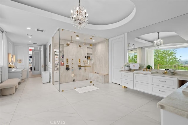 25548 Kingston Ct, Calabasas, CA 91302 - full bathroom with a chandelier, a shower stall, vanity, recessed lighting, and a tray ceiling
