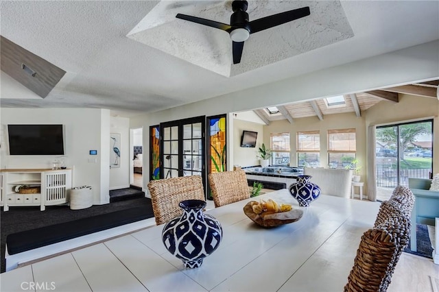 18016 Mariner Dr, Victorville, CA 92395 - living room with a textured ceiling and a ceiling fan