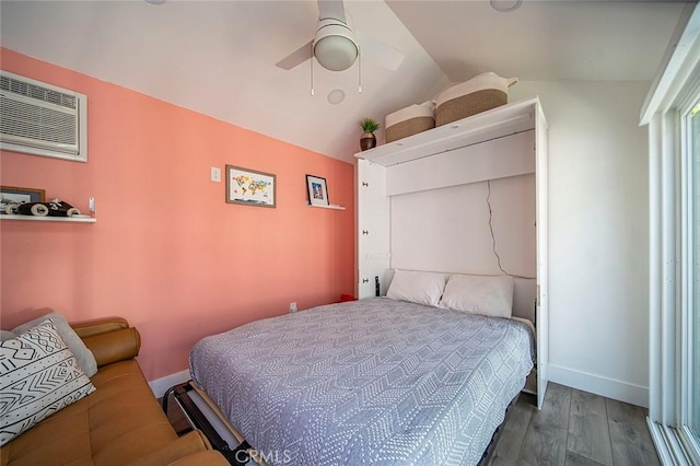 4218 E 3rd St, Long Beach, CA 90814 - bedroom with a wall mounted air conditioner, wood finished floors, vaulted ceiling, baseboards, and ceiling fan