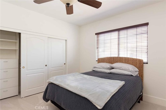 23317 Cuestport Dr, Valencia, CA 91354 - bedroom featuring a closet, light colored carpet, and ceiling fan