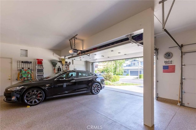23317 Cuestport Dr, Valencia, CA 91354 - garage featuring a garage door opener