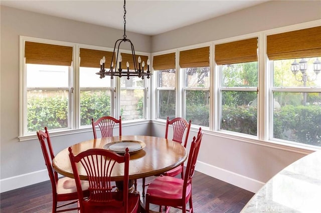 23317 Cuestport Dr, Valencia, CA 91354 - dining room with a chandelier, baseboards, and dark wood-type flooring