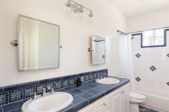 23317 Cuestport Dr, Valencia, CA 91354 - bathroom with double vanity, toilet, shower / bath combination with curtain, and decorative backsplash