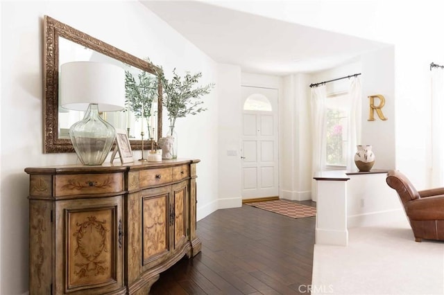 23317 Cuestport Dr, Valencia, CA 91354 - entryway featuring dark wood-type flooring and baseboards