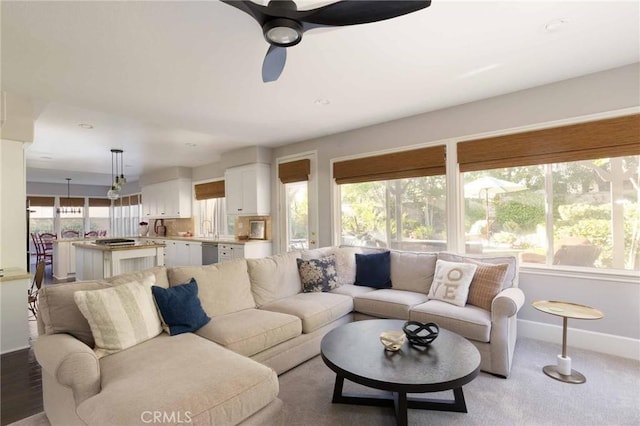23317 Cuestport Dr, Valencia, CA 91354 - living area featuring baseboards and a ceiling fan